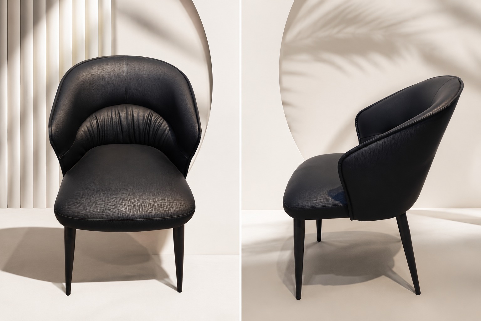 Black curved leather chair with rounded back and slim legs