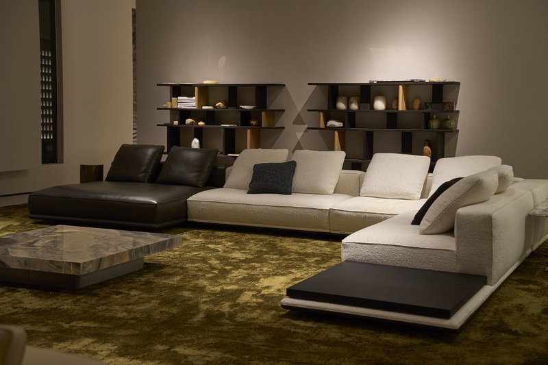 Project furniture showroom with sectional sofas and shelving