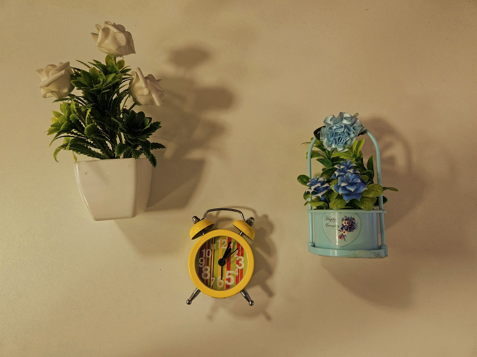 Home decor arrangement with candles and decorative items