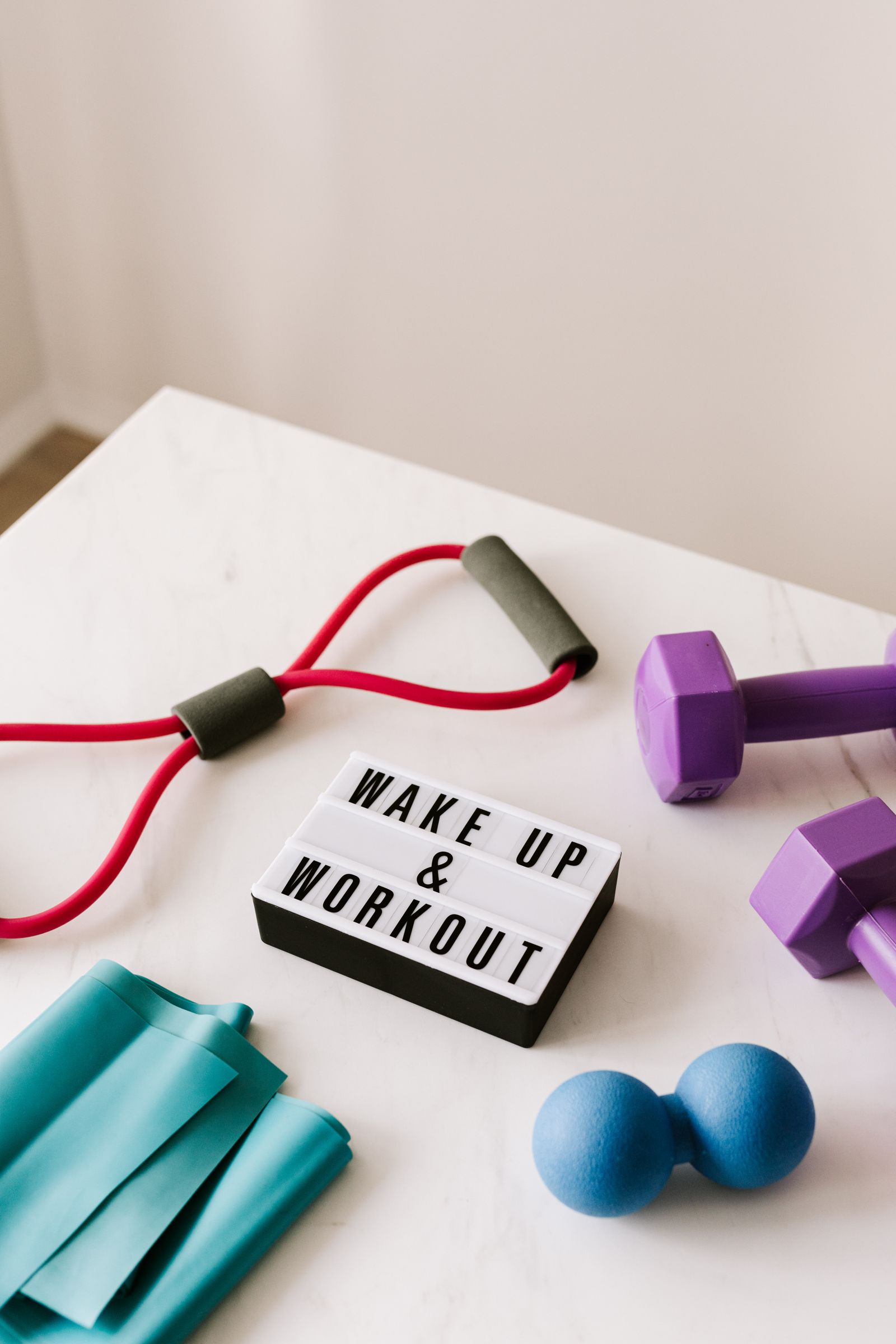 Home workout accessories with resistance bands and dumbbells