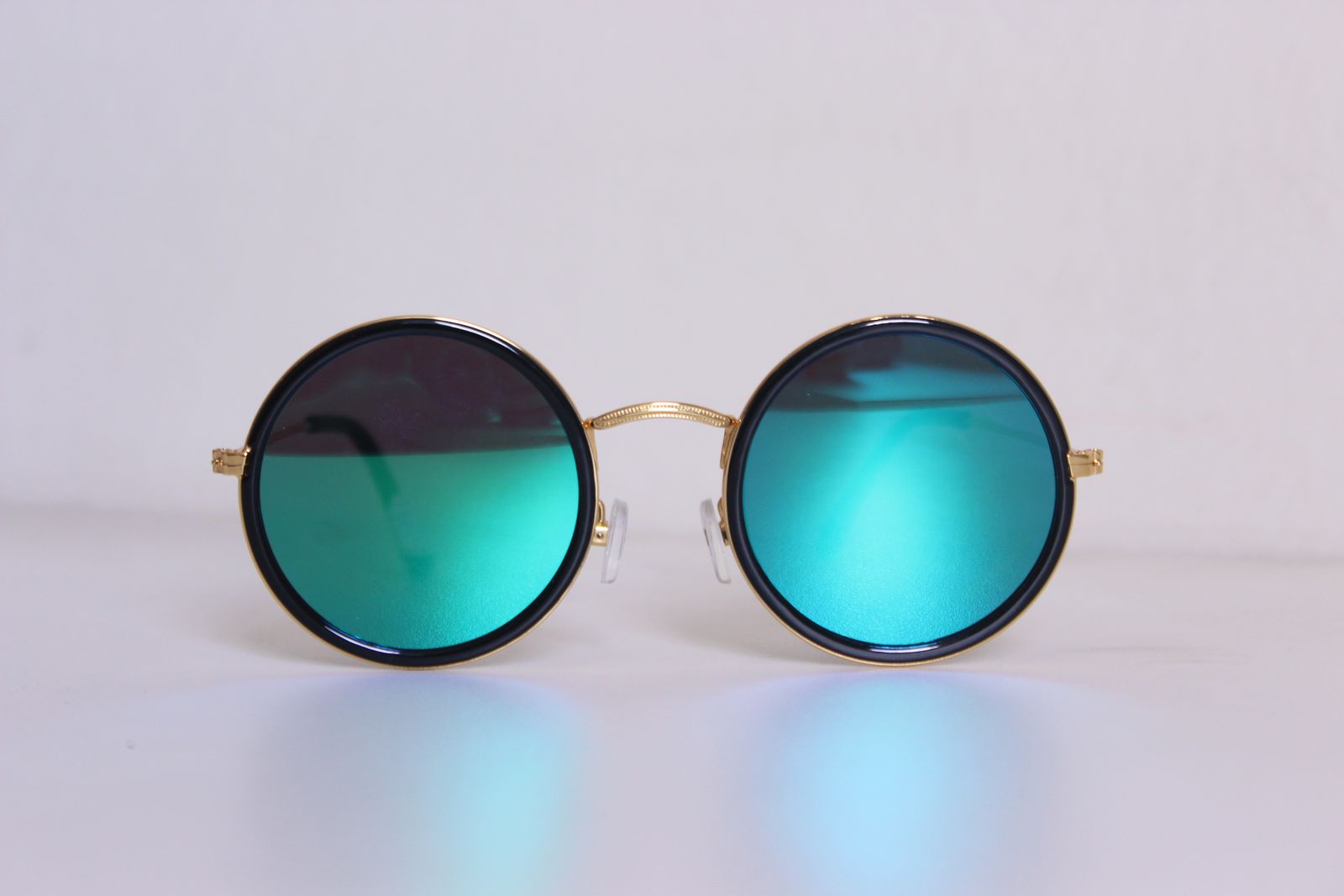 Round fashion sunglasses product shot on a white background